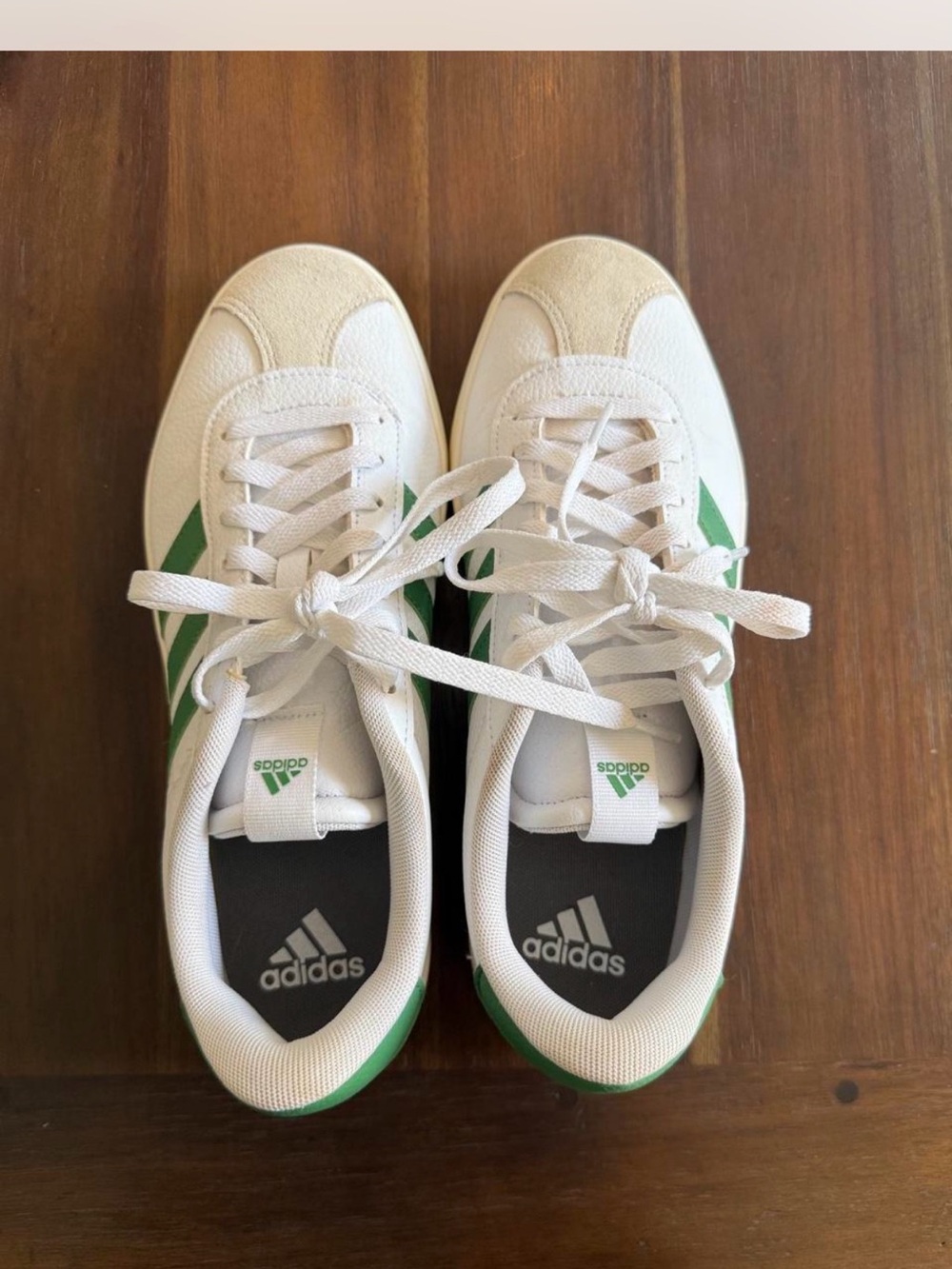Adidas women’s 9.5 white and Green Casual Sneakers